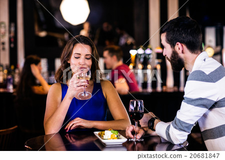 Couple having a drink Couple having a drink 20681847