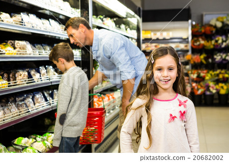 Father and kids at the grocery store Father and kids at the grocery store 20682002