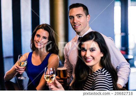Friends having a drink 20682718
