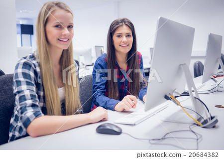 Students working on computer 20684382