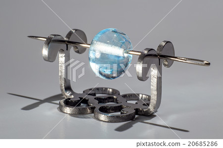 Blue clear glassy bead on the needle 20685286