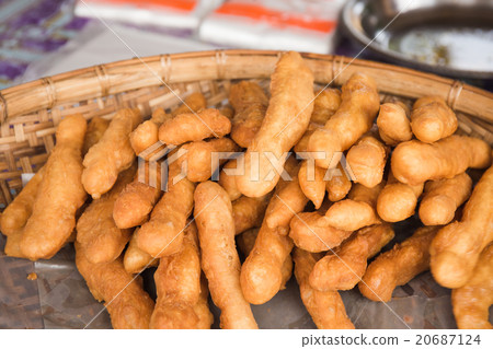 Deep fried dough sticks 20687124