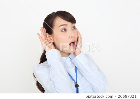 Business woman to be surprised to hear it Business woman to be surprised to hear it 20687321