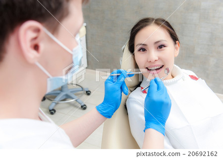 Young female patient at dentist office Young female patient at dentist office 20692162