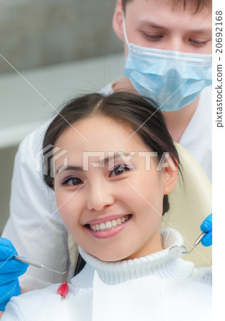 Young female patient at dentist office 20692168