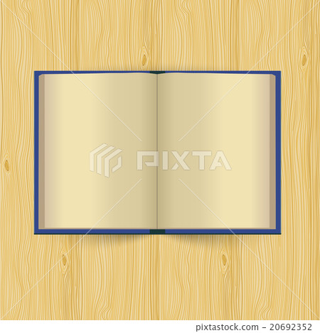 Opened book with yellow pages on wooden background 20692352