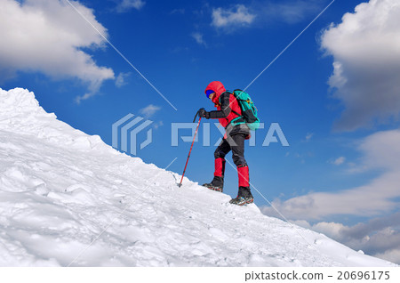 The man in the winter journey with a backpack. 20696175
