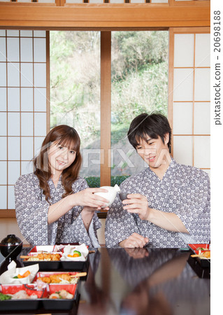 Family traveling couple with inn ryokan banquet 20698188