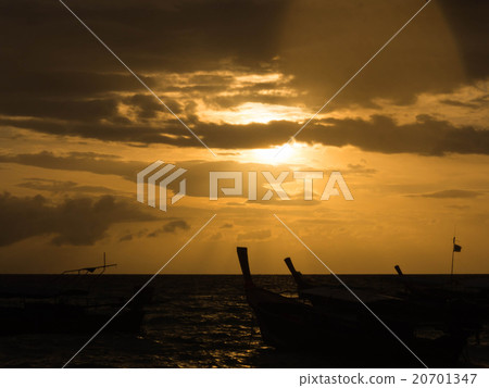 Siluate boats on the sea 20701347