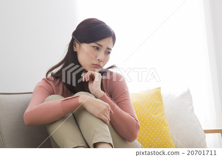 Negative image Young woman sitting in Negative image Young woman sitting in 20701711