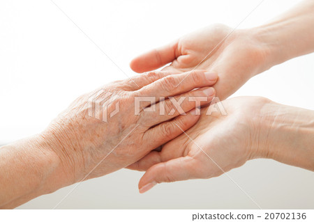 Take hands of elderly hands and hand 20702136