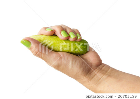 Hand holding cucumber 20703159