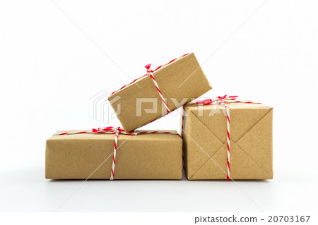Cardboard carton wrapped with brown paper. Cardboard carton wrapped with brown paper. 20703167
