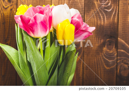 Bouquet Of Tulips In Front Of Spring Scene 20709105