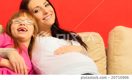 pregnant woman with her daughter pregnant woman with her daughter 20710906