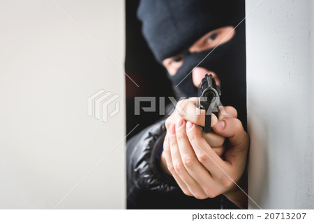 Aiming murderer with a gun Aiming murderer with a gun 20713207