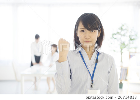 Business woman doing a fist pump Business woman doing a fist pump 20714818