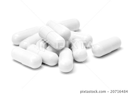 White medicine capsules isolated on white 20716484