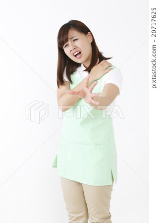 A woman in an apron A woman in an apron 20717625
