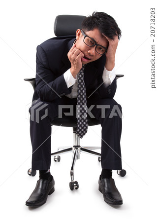 Businessman having stress on white background 20718203