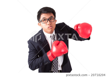 Businessman with red boxing gloves Businessman with red boxing gloves 20718204