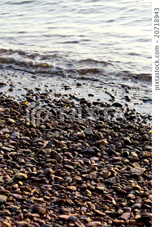 Sea pebble, gravel beach, selective focus. 20718943