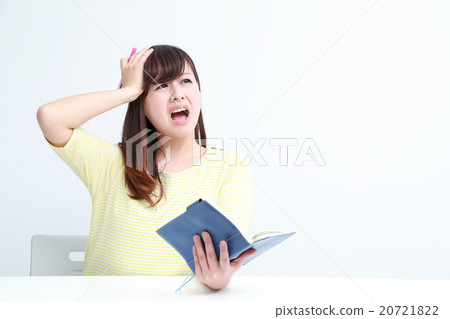 A woman scooping at the notebook 20721822