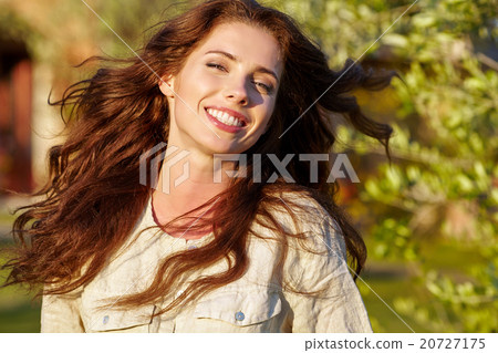 Woman in summer field. Young girl relax outdoors. Woman in summer field. Young girl relax outdoors. 20727175