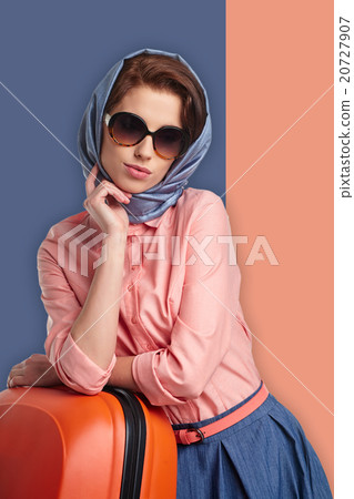 Fashion woman in sunglasses and scarf.  20727907