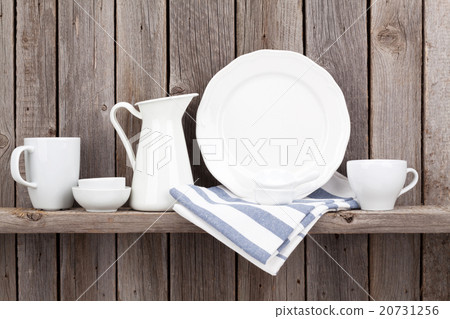 Kitchen utensils on shelf 20731256