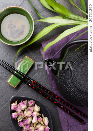 Asian sushi chopsticks, rose tea and teapot Asian sushi chopsticks, rose tea and teapot 20731260