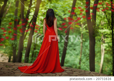 Woman on the edge of a precipice. 20731616