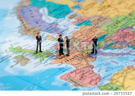 Miniature business people on map of Europe 20733587