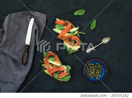 Sandwiches with smoked salmon, avocado, spinach Sandwiches with smoked salmon, avocado, spinach 20735282