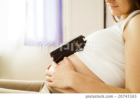 Pregnant woman with book Pregnant woman with book 20743163