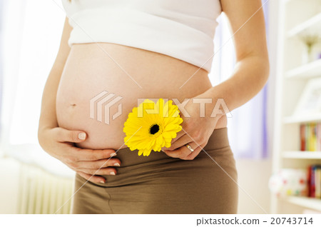 Pregnant woman at home Pregnant woman at home 20743714