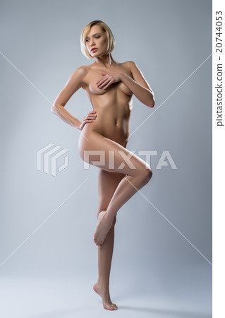 Attractive blonde gracefully posing nude Attractive blonde gracefully posing nude 20744053