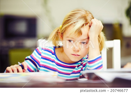 Girl is doing homework 20746677