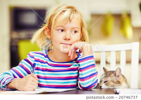 Girl is doing homework Girl is doing homework 20746737