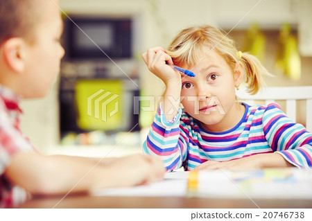 Siblings are doing homework Siblings are doing homework 20746738