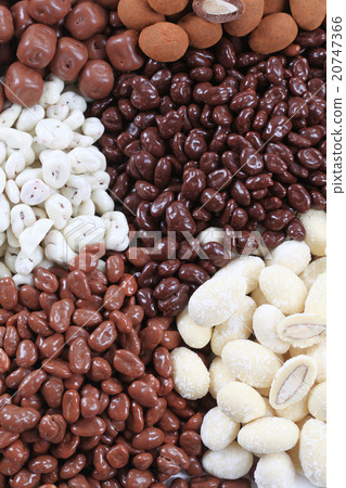 Chocolate covered nuts and dried fruit 20747366