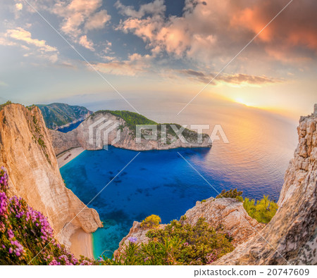 Navagio beach with sunset on Zakynthos,Greece Navagio beach with sunset on Zakynthos,Greece 20747609