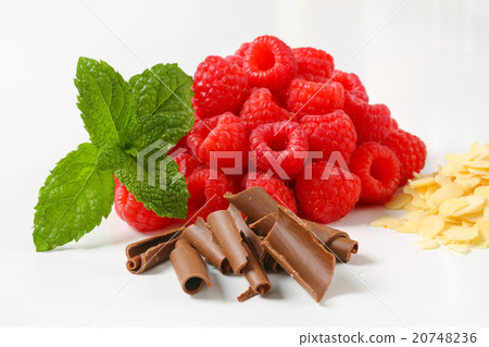 Fresh raspberries, chocolate curls and sliced almonds 20748236