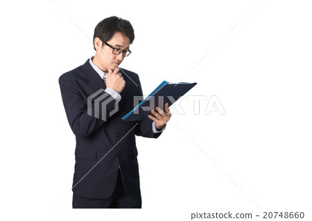 Asian businessman reading important information 20748660