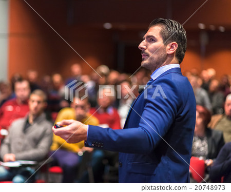 Public speaker giving talk at Business Event. Public speaker giving talk at Business Event. 20748973