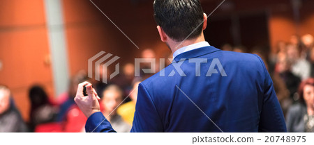Public speaker giving talk at Business Event. Public speaker giving talk at Business Event. 20748975