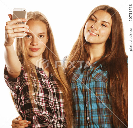cute teenage girls making selfie isolated 20751718