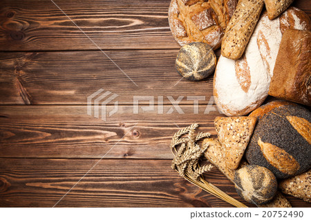 Bread assortment on wooden surface 20752490