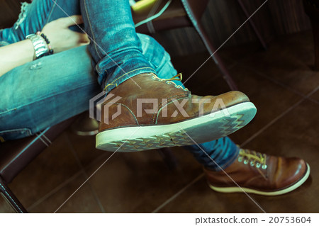brown boot leather shoes and jean pants clothing brown boot leather shoes and jean pants clothing 20753604