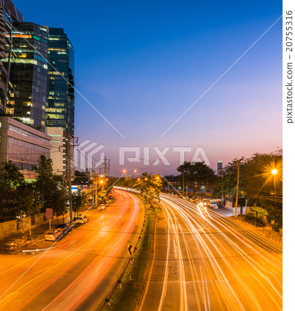 night scene of city with light trail on road night scene of city with light trail on road 20755316
